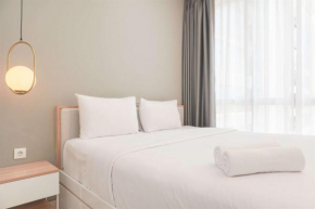 Minimalist and Cozy 1BR Ciputra World 2 Apartment By Travelio